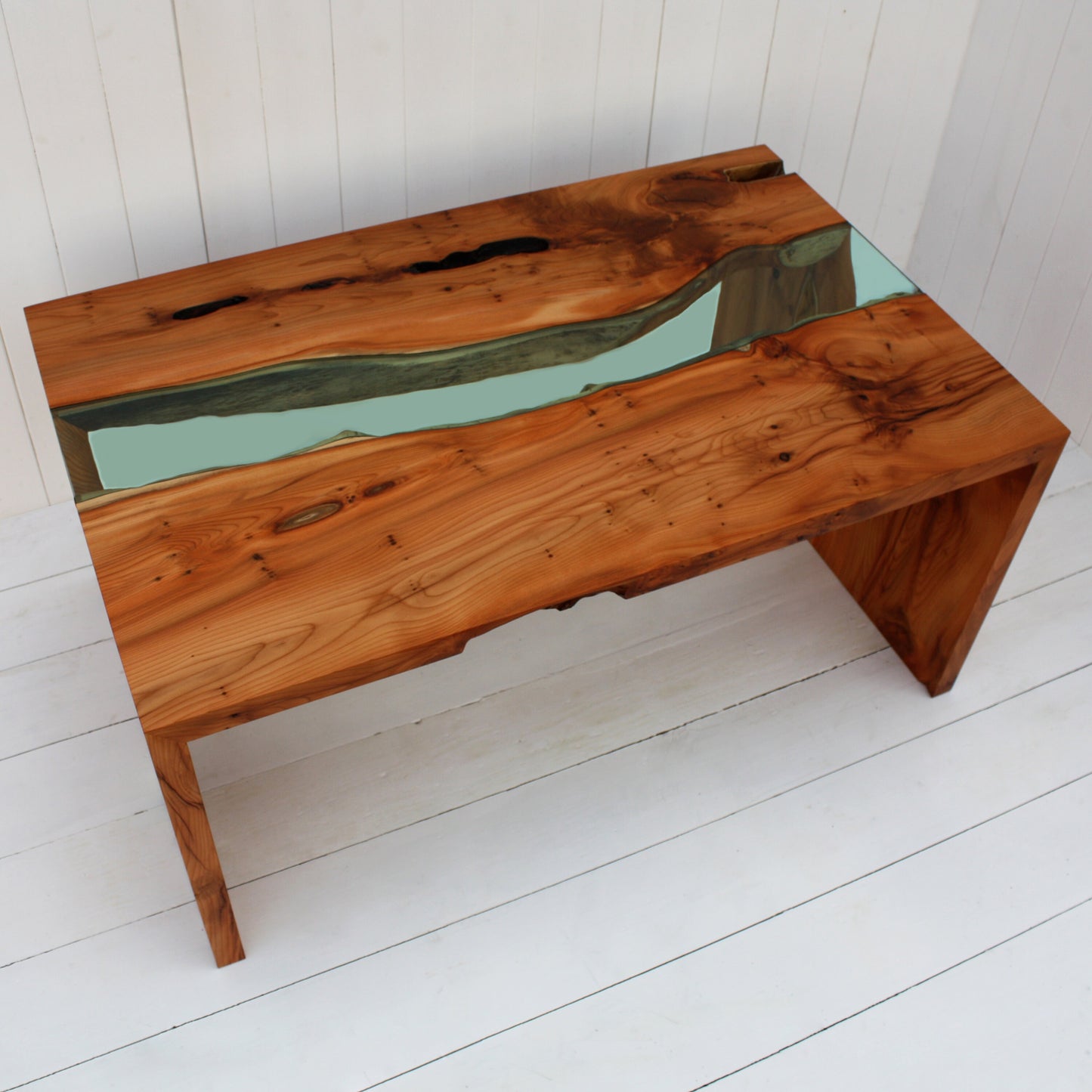 Yew and glass river coffee table
