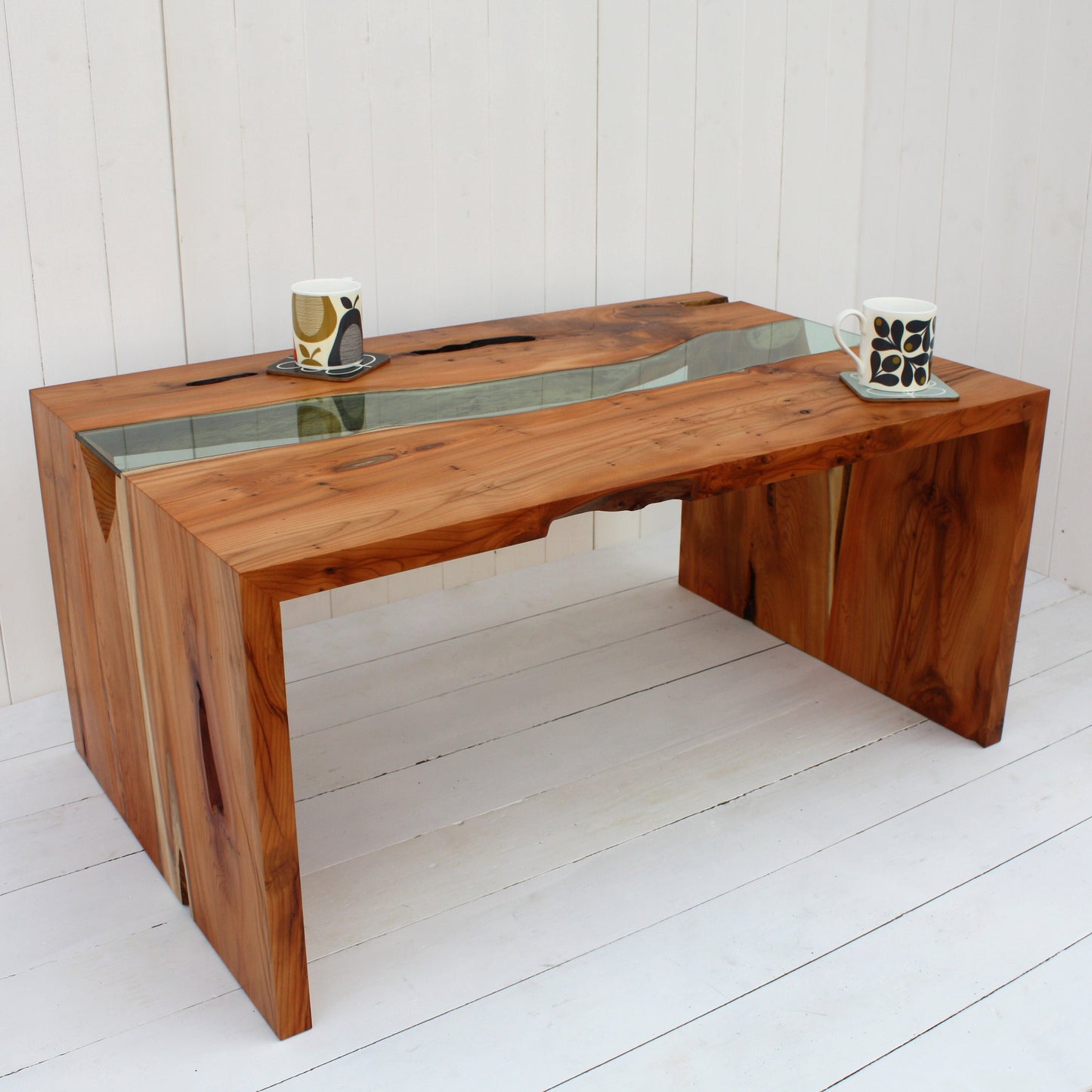 Yew and glass river coffee table